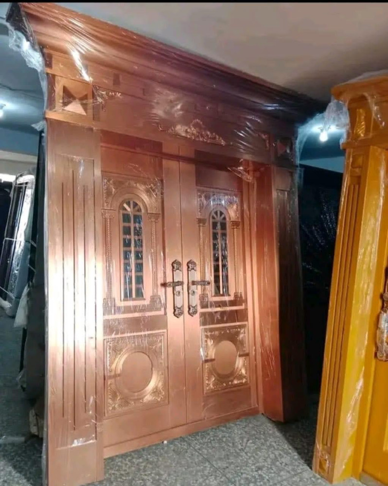 Cast Copper Security Door with Glass inserts and decorative handles