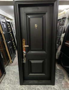Black Security Door likely a Watson Chinese Security Door or Similar Steel Door
