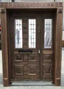 Double-door style Security Door with a wood-grain finish and glass insert