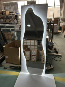 Full-length Backlit Led mirror with an irregular wavy shape