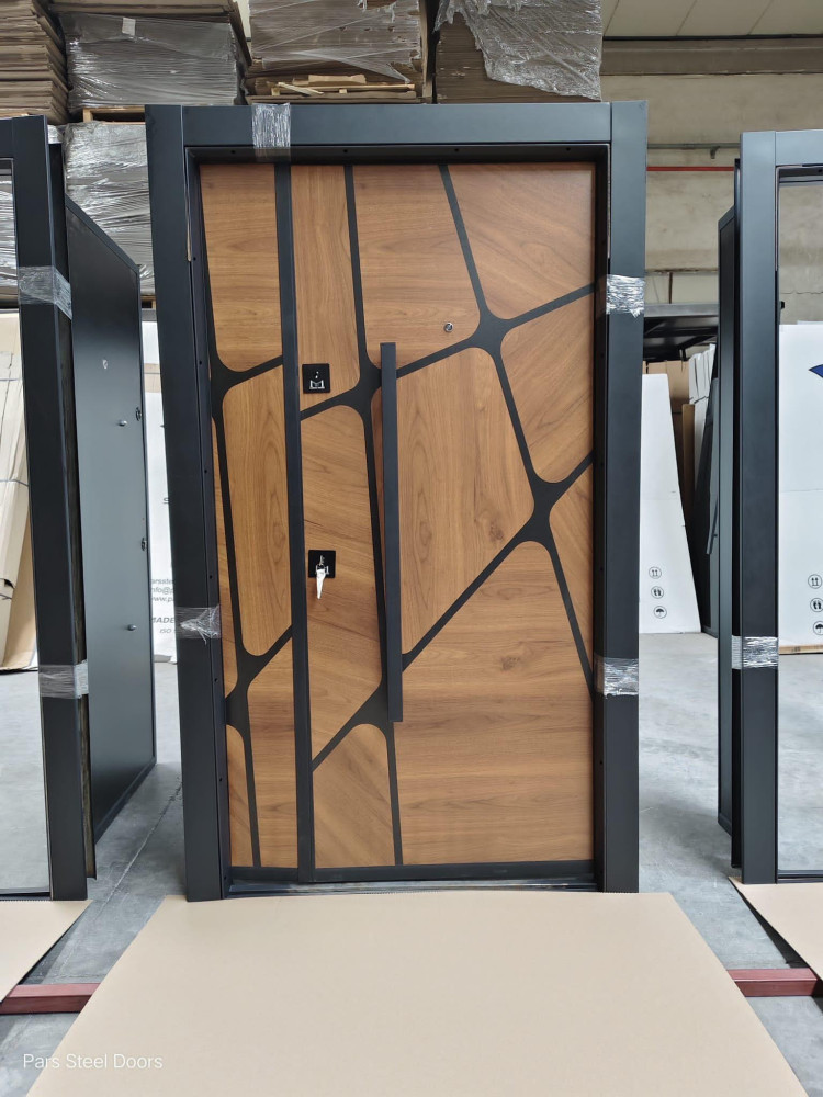 Turkish Luxury Security Door with a wood finish and a geometric black metal inlay design