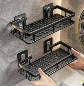 Two black wall-mounted bathroom organizer shelves