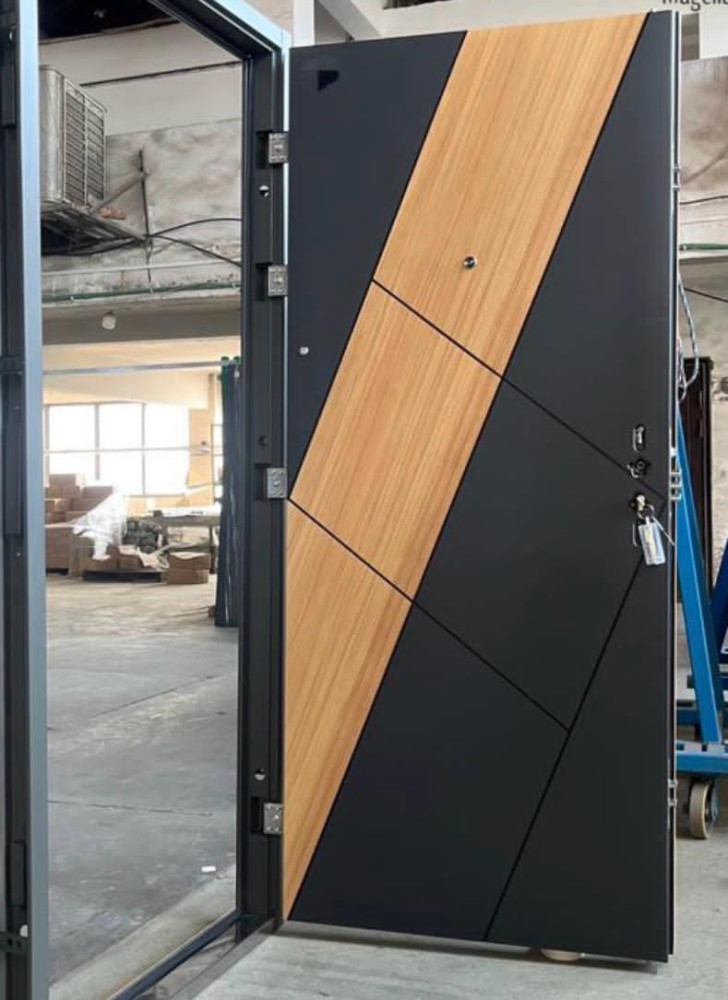 Modern Black and wood-look Security door featurin a diagonal panel design