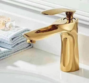 gold-finished single-hole bathroom sink faucet