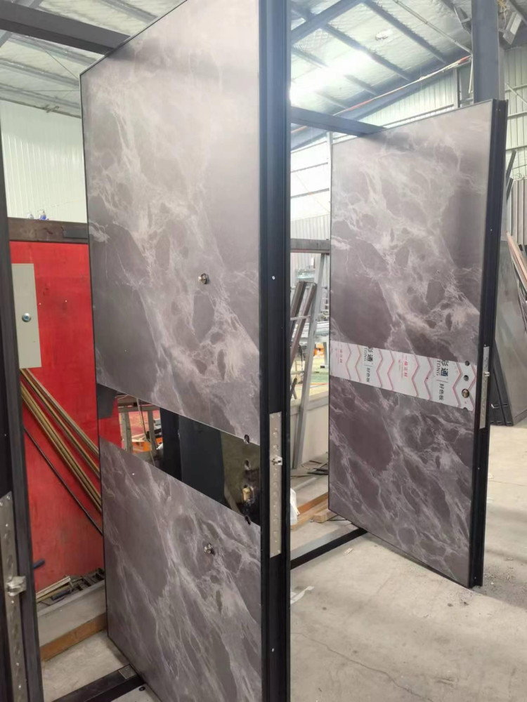 Pivot Door with a marble-effect panel 