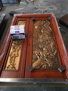 Hardwood-faced Door with Elaborate Carved Metal Panels