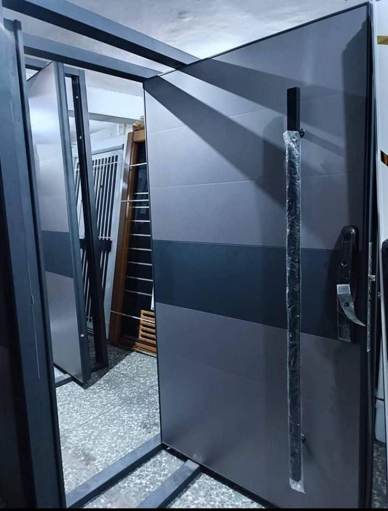 Modern Pivot door with sleek design and integrated smart lock system