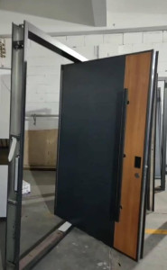 Modern Security Door with a frame and a combination of dark panels and wood-finish Sections