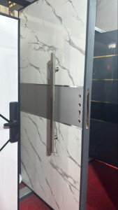Modern Pivot Door with a White marble-effect finish 