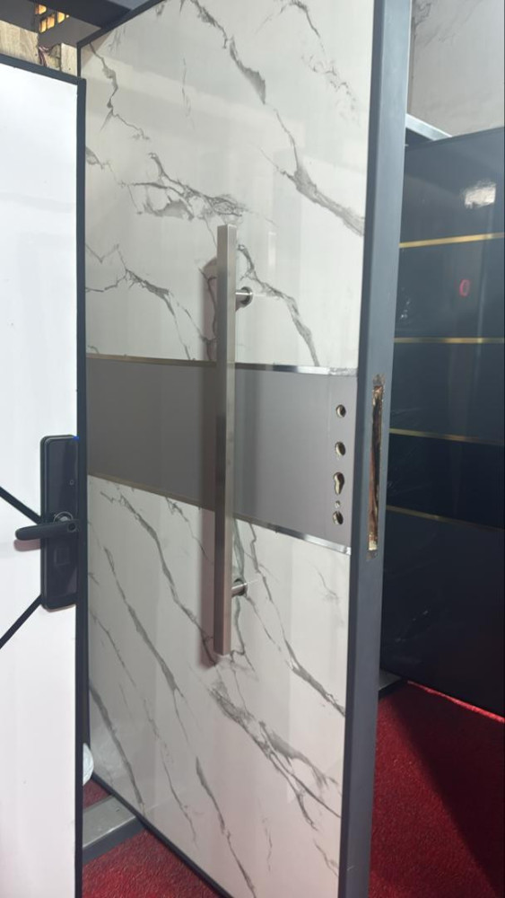Modern Pivot Door with a White marble-effect finish 