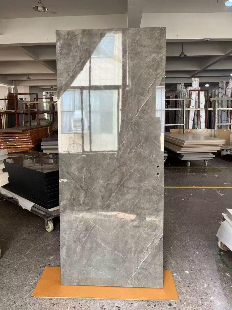 large polished slab of grey marble or marble-effect tile