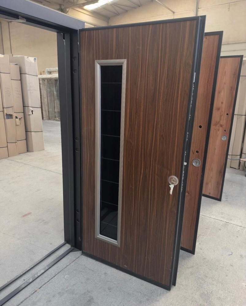 Turkish full metal security Door with a wood finish and vertical glass panel