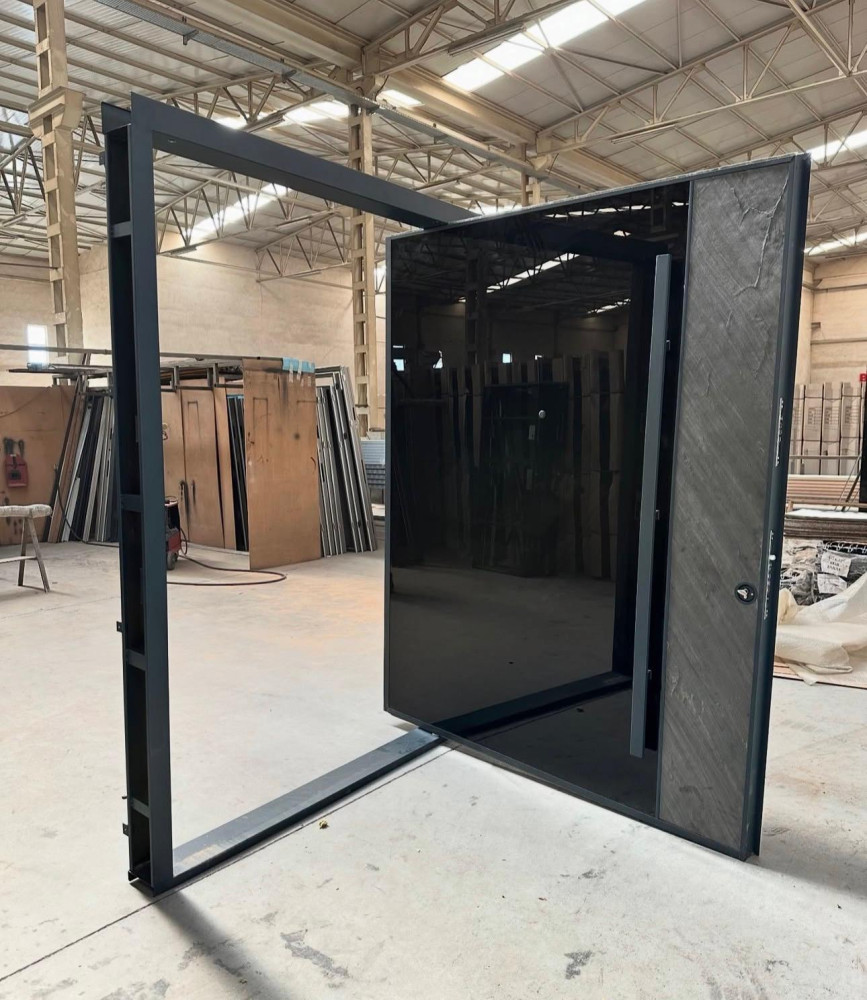 Black glass and stone Turkey Security Door with a pivot hinge mechanism