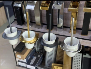 wall-mounted toilet brushes and holders available in various finishes like gold, silver and black