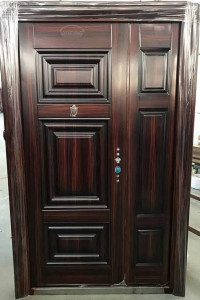Watson Time Security Door with a dark wood-grain finish